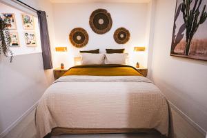 Voodi või voodid majutusasutuse Condo Enjoy toas
