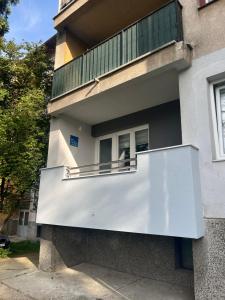 a balcony on the side of a building at Apartment Amra in Visoko