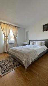 מיטה או מיטות בחדר ב-Casa Nicoladis
