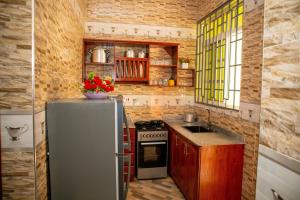Köök või kööginurk majutusasutuses Villa Home Apartment Dodoma