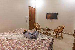 Dhruva - Luxury Villa in CBD客房内的一张或多张床位