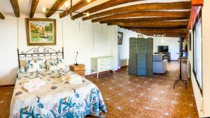 A bed or beds in a room at CASA CAPITÁN INDALECIO.