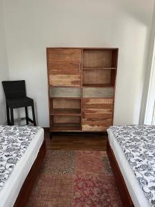 Postel nebo postele na pokoji v ubytování Hus Dunya