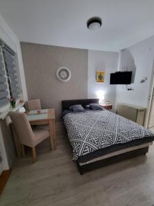 Postel nebo postele na pokoji v ubytování Studio 15