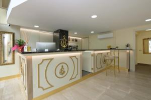 Kuchyň nebo kuchyňský kout v ubytování Hotel Ristorante Commercio