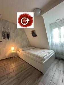 Postel nebo postele na pokoji v ubytování Modern Living Apartment Hotel