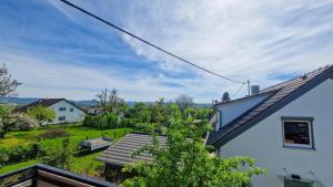 a view from the roof of a white house at MaMi Apartments - Cloud 9 in Pliezhausen