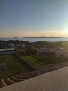 a view of the ocean from the top of a hill at Sandra in Pontevedra