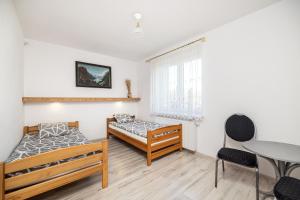 Postel nebo postele na pokoji v ubytování Agroturystyka ''Panorama''