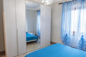 En eller flere senge i et værelse på La Casetta