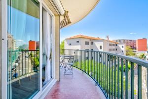 a balcony with a view of the city at Confortable 2 pièces 54 m2 proche de la mer in Nice