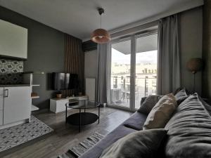 Zona d'estar a White Swan Apartment