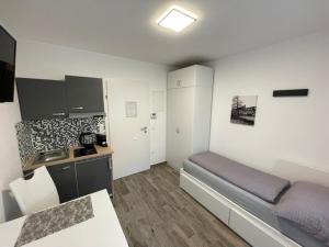 Η κουζίνα ή μικρή κουζίνα στο Nici´s Appartements