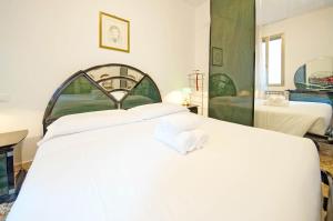 Posteľ alebo postele v izbe v ubytovaní DolceVita Apartments N 496