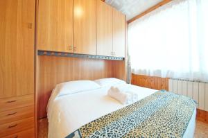Posteľ alebo postele v izbe v ubytovaní DolceVita Apartments N 496