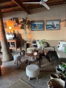a living room with a couch and a table at Los Corales in Máncora