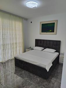 Ένα ή περισσότερα κρεβάτια σε δωμάτιο στο Отель яблоневый сад