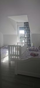 Postel nebo postele na pokoji v ubytování PALMandre (Pag Apartment Luxurious)