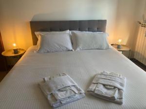 Ένα ή περισσότερα κρεβάτια σε δωμάτιο στο L’Archè Comfort & Relax – Squirrel House