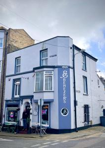 a blue building on the side of a street at Ebenezer's Place in Broadstairs