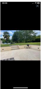 a picture of a park with a monument in the middle at Les cahutes in Trémolat +2 photos