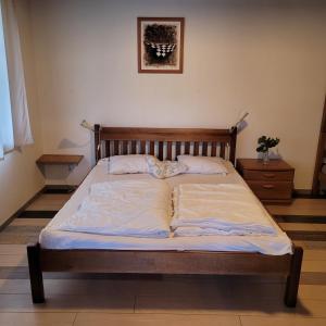 Postel nebo postele na pokoji v ubytování Chloumek