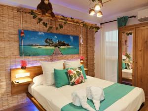 Łóżko lub łóżka w pokoju w obiekcie Wonder Nerja Paraiso Apartamento