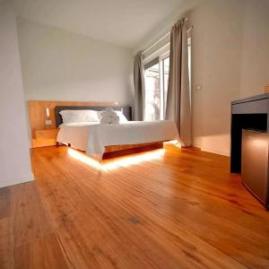 a large bedroom with a bed and a fireplace at Taormina Boutique Rooms in Taormina +45 photos