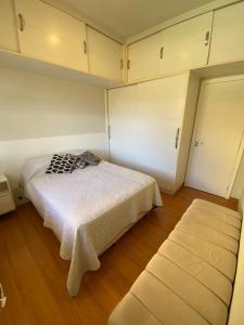 En eller flere senge i et værelse på Refugio Bela Vista