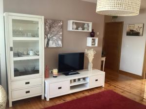TV a/nebo společenská místnost v ubytování EL HOGAR DE LA CASTAÑERA