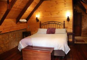 Ένα ή περισσότερα κρεβάτια σε δωμάτιο στο Beedelup House Cottages