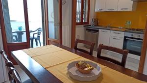 Η κουζίνα ή μικρή κουζίνα στο SeaGarden Apartment