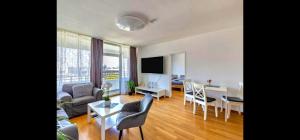 a living room with a couch and a table at Stunning 1-Bed Apartment in Neuss in Neuss