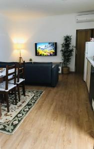 TV a/nebo společenská místnost v ubytování Casa de Férias MariCeu Mirandela