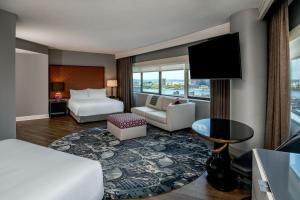 a hotel room with a bed and a tv at The Westin Copley Place, Boston in Boston