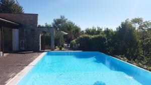 The swimming pool at or close to Villa Giotto