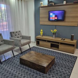 Uma TV ou centro de entretenimento em Espectacular Departamento - Excelente Ubicación