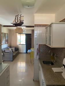 Kuchyň nebo kuchyňský kout v ubytování Guarajuba- Pé na Areia . Condoninio- Genipabu Summer House- o melhor condominio da região + 25 fotografií