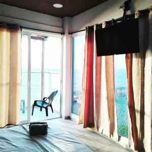 TV a/nebo společenská místnost v ubytování Sueños en la playa + 27 fotografií