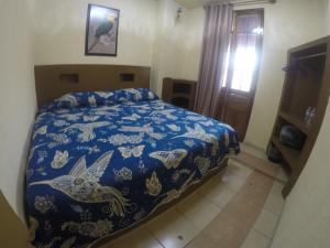 Postel nebo postele na pokoji v ubytování Hospedaje La Mexicana + 19 fotografií