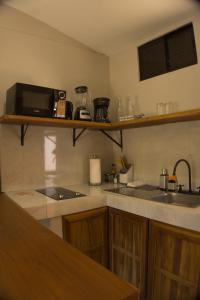 Η κουζίνα ή μικρή κουζίνα στο Jacaranda