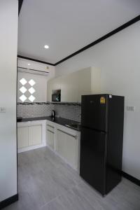 ครัวหรือมุมครัวของ MB House Resort