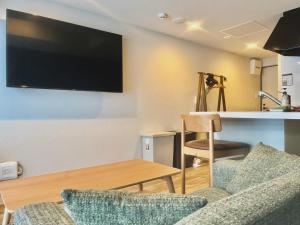 TV a/nebo společenská místnost v ubytování Stay`sOTARU
