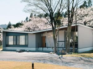 a white house with trees in front of it at TEF TANIGUMI - Vacation STAY 78766v 