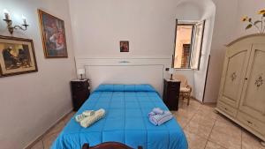 Postel nebo postele na pokoji v ubytování Palazzo Tranfo Al Duomo Accommodation