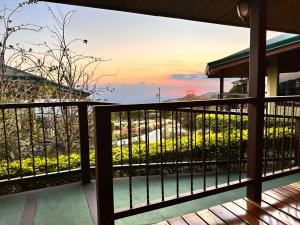 a balcony with a view of the ocean at Hotel Trópico Monteverde in Monteverde Costa Rica +45 photos