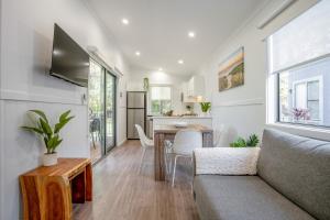 a living room with a couch and a table at BIG4 Tasman Holiday Parks - Nambucca Heads in Nambucca Heads