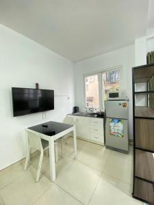 Nhà bếp/bếp nhỏ tại MH Serviced Apartment