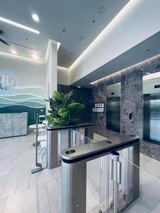 a kitchen with a island in a room at Fuji homestay Hạ Long in Ha Long