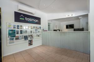 a waiting room with a sign on a wall at BIG4 Tasman Holiday Parks - Nambucca Heads in Nambucca Heads +143 photos